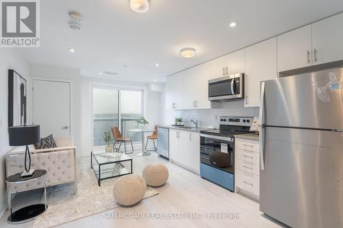 416 - 3401 Ridgeway Drive, Mississauga (Erin Mills), ON - Indoor Photo Showing Kitchen With Stainless Steel Kitchen