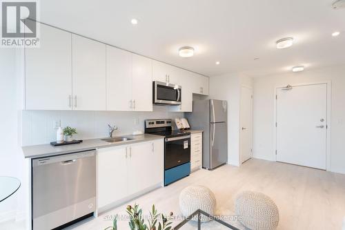 416 - 3401 Ridgeway Drive, Mississauga (Erin Mills), ON - Indoor Photo Showing Kitchen With Stainless Steel Kitchen