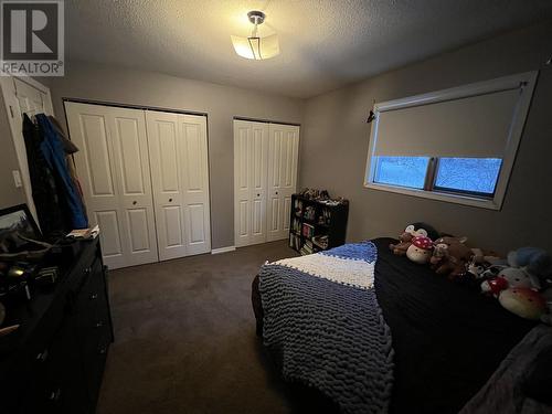 15 Walsh Road, Fort Nelson, BC - Indoor Photo Showing Bedroom