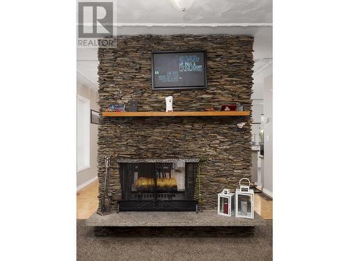 2999 Charella Drive, Prince George, BC - Indoor Photo Showing Living Room With Fireplace