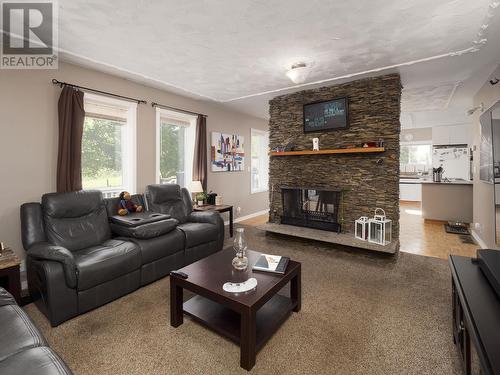 2999 Charella Drive, Prince George, BC - Indoor Photo Showing Living Room With Fireplace