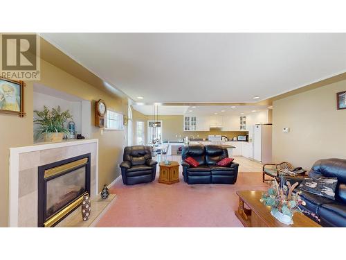 848 Rolph Street, Quesnel, BC - Indoor Photo Showing Living Room With Fireplace