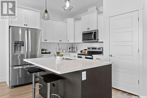 58 900 St Andrews Lane, Warman, SK - Indoor Photo Showing Kitchen With Upgraded Kitchen