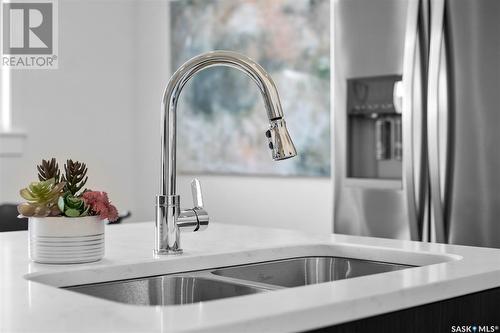 58 900 St Andrews Lane, Warman, SK - Indoor Photo Showing Kitchen With Double Sink