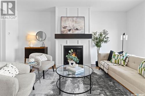 58 900 St Andrews Lane, Warman, SK - Indoor Photo Showing Living Room With Fireplace