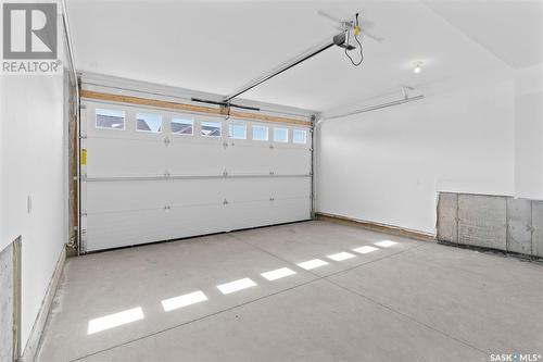 58 900 St Andrews Lane, Warman, SK - Indoor Photo Showing Garage