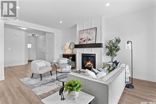 58 900 St Andrews Lane, Warman, SK - Indoor Photo Showing Living Room With Fireplace