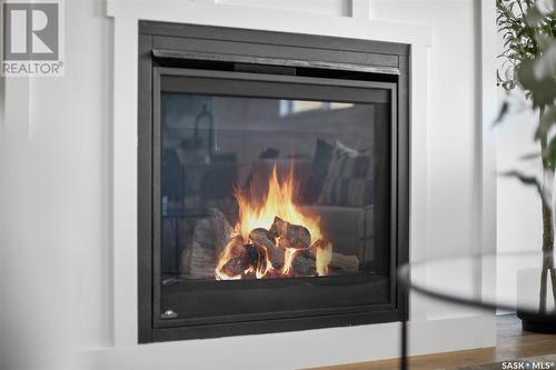 58 900 St Andrews Lane, Warman, SK - Indoor Photo Showing Living Room With Fireplace