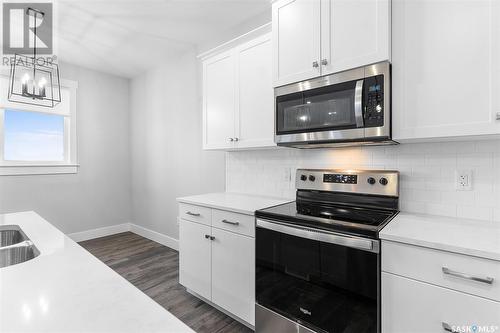 57 900 St Andrews Lane, Warman, SK - Indoor Photo Showing Kitchen With Double Sink