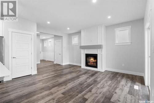 57 900 St Andrews Lane, Warman, SK - Indoor Photo Showing Living Room With Fireplace