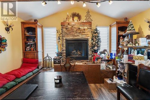 2211 Front Road, Lasalle, ON - Indoor Photo Showing Living Room With Fireplace