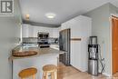 14 Mallard Cove, Big Shell, SK  - Indoor Photo Showing Kitchen With Double Sink 