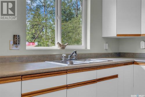 14 Mallard Cove, Big Shell, SK - Indoor Photo Showing Kitchen With Double Sink