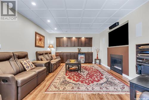 14 Mallard Cove, Big Shell, SK - Indoor Photo Showing Living Room With Fireplace