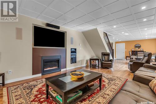 14 Mallard Cove, Big Shell, SK - Indoor Photo Showing Living Room With Fireplace