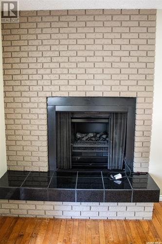 118 Caskey Drive, Melfort, SK - Indoor Photo Showing Living Room With Fireplace