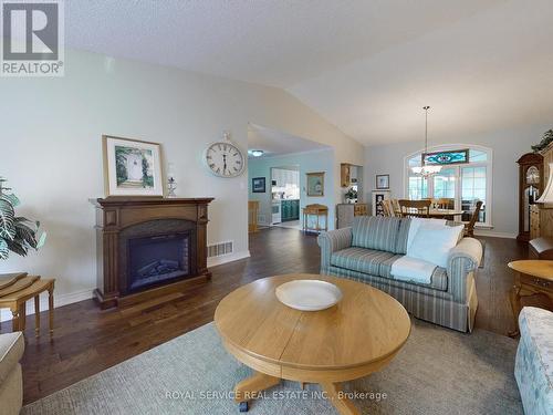 32 Niagara Trail, Clarington, ON - Indoor Photo Showing Living Room With Fireplace