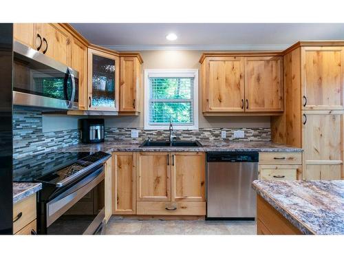 7730 Columbia Drive, Anglemont, BC - Indoor Photo Showing Kitchen With Double Sink