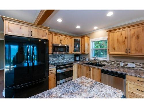 7730 Columbia Drive, Anglemont, BC - Indoor Photo Showing Kitchen With Double Sink