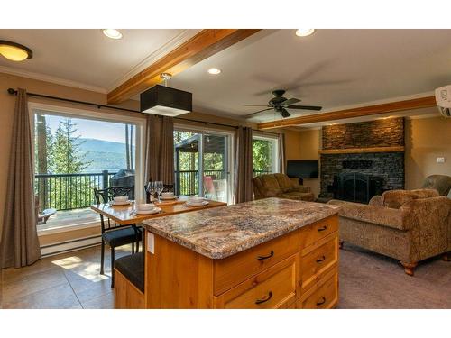 7730 Columbia Drive, Anglemont, BC - Indoor With Fireplace