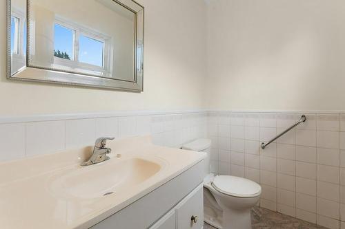 2 pc bath on main level - 119 Woodman Drive N, Hamilton, ON - Indoor Photo Showing Bathroom