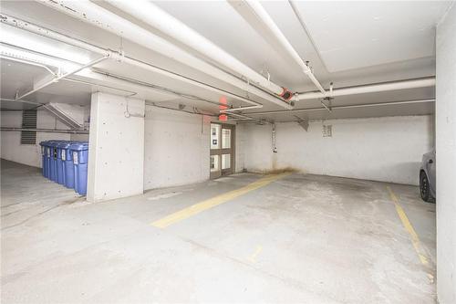 Parking spot - 400 York Boulevard|Unit #201, Hamilton, ON - Indoor Photo Showing Garage