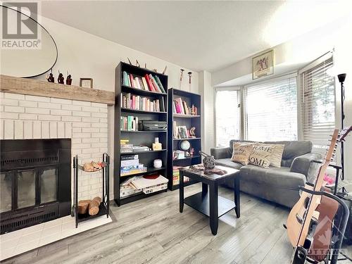 40 Stable Way, Kanata, ON - Indoor Photo Showing Living Room With Fireplace