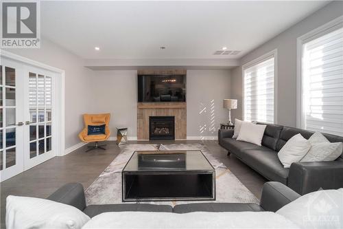 22 Golflinks Drive, Ottawa, ON - Indoor Photo Showing Living Room With Fireplace