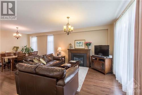536 Golden Sedge Way, Ottawa, ON - Indoor Photo Showing Living Room With Fireplace