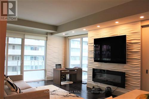 525 - 29 Queens Quay E, Toronto, ON - Indoor Photo Showing Living Room With Fireplace