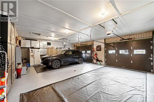 27 Thomas Lane East, Campbellton, NB - Indoor Photo Showing Garage