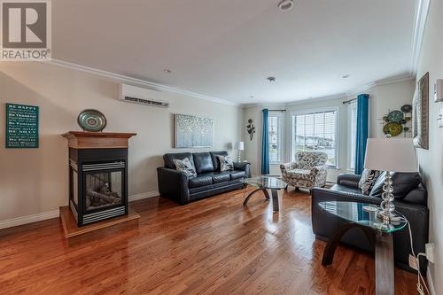 63 Ellesmere Avenue, Paradise, NL - Indoor Photo Showing Living Room With Fireplace