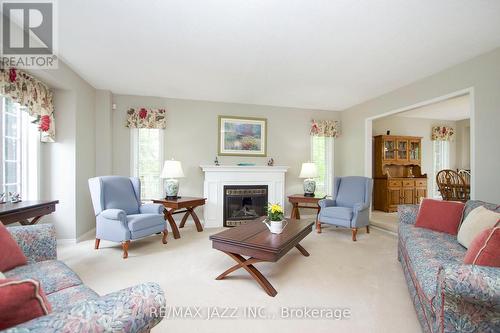 35 Castle Harbour Drive, Scugog, ON - Indoor Photo Showing Living Room With Fireplace