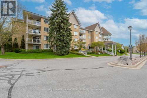 209 - 51 Rivermill Boulevard, Kawartha Lakes, ON - Outdoor With Balcony With Facade