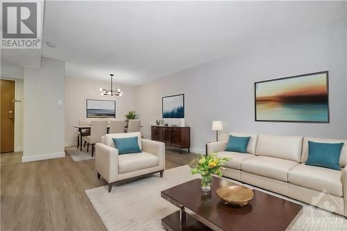 This photo is virtually staged - 199 Kent Street Unit#1109, Ottawa, ON - Indoor Photo Showing Living Room