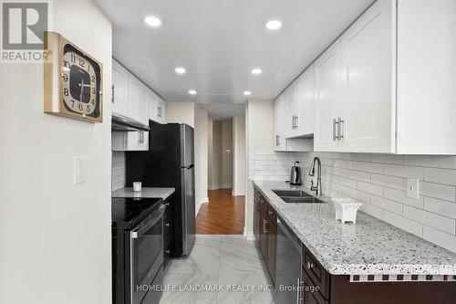 721 - 11753 Sheppard Avenue E, Toronto, ON - Indoor Photo Showing Kitchen With Double Sink With Upgraded Kitchen