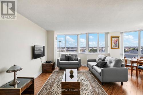 721 - 11753 Sheppard Avenue E, Toronto, ON - Indoor Photo Showing Living Room