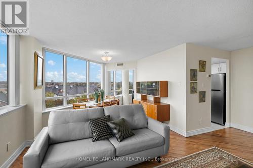 721 - 11753 Sheppard Avenue E, Toronto, ON - Indoor Photo Showing Living Room