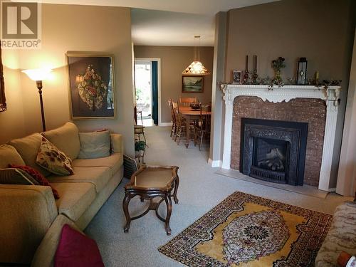 1880A Kootenay  Avenue, Rossland, BC - Indoor Photo Showing Living Room With Fireplace