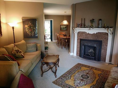 1880A Kootenay Avenue, Rossland, BC - Indoor Photo Showing Living Room With Fireplace