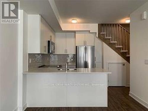 22 - 3472 Widdicombe Way, Mississauga, ON - Indoor Photo Showing Kitchen With Double Sink