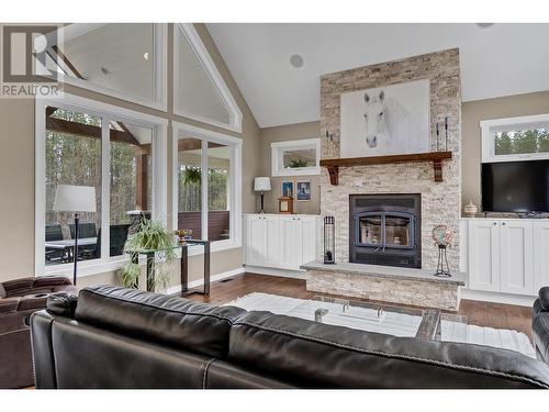 10380 Lolland Crescent, Prince George, BC - Indoor Photo Showing Living Room With Fireplace
