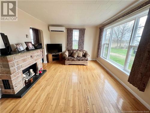 1186 Frenette Street, Bathurst, NB - Indoor Photo Showing Living Room With Fireplace