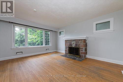 60 Shanty Bay Road, Barrie (North Shore), ON - Indoor Photo Showing Living Room With Fireplace