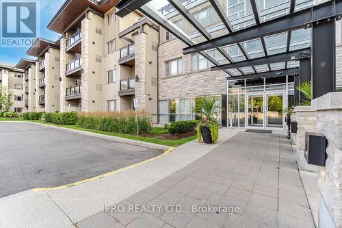 114 - 570 Lolita Gardens, Mississauga, ON - Outdoor With Balcony With Facade