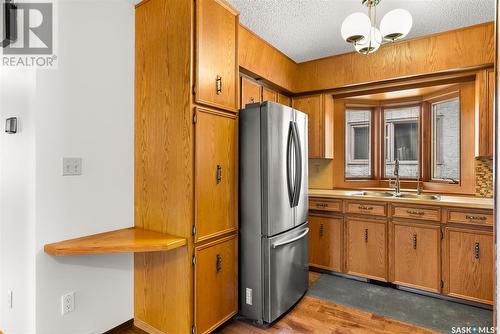 3006 Salterio Crescent E, Regina, SK - Indoor Photo Showing Kitchen With Double Sink