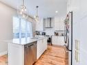 Cuisine - 380 Rue Fairfield, Longueuil (Greenfield Park), QC  - Indoor Photo Showing Kitchen With Stainless Steel Kitchen With Upgraded Kitchen 