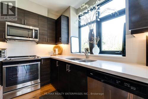 303 - 90 Orchard Point Road, Orillia, ON - Indoor Photo Showing Kitchen With Double Sink With Upgraded Kitchen