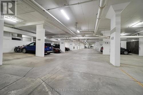 303 - 90 Orchard Point Road, Orillia, ON - Indoor Photo Showing Garage