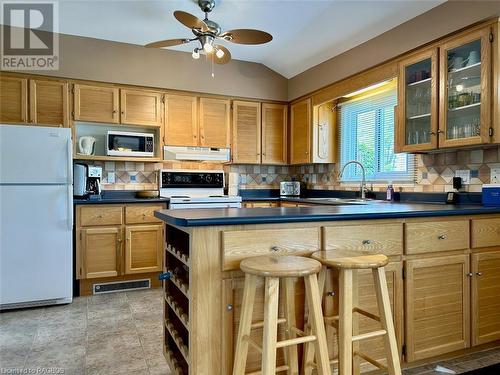 Crisp, clean solid wood kitchen. - 5 Mill Point Road, North Bruce Peninsula, ON - Indoor Photo Showing Kitchen With Double Sink